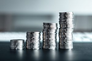 Silver coins stacked up on the desk,money growth